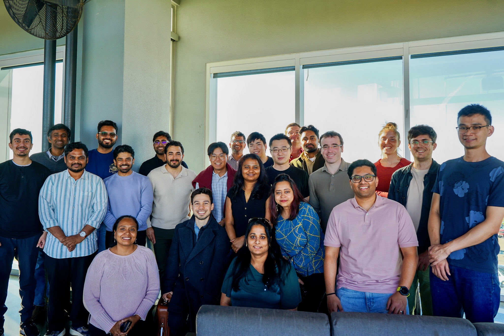 Members of the Amazon Health AI team posing together at a golf driving range in California to celebrate the launch of Amazon Health AI for Prime Members.